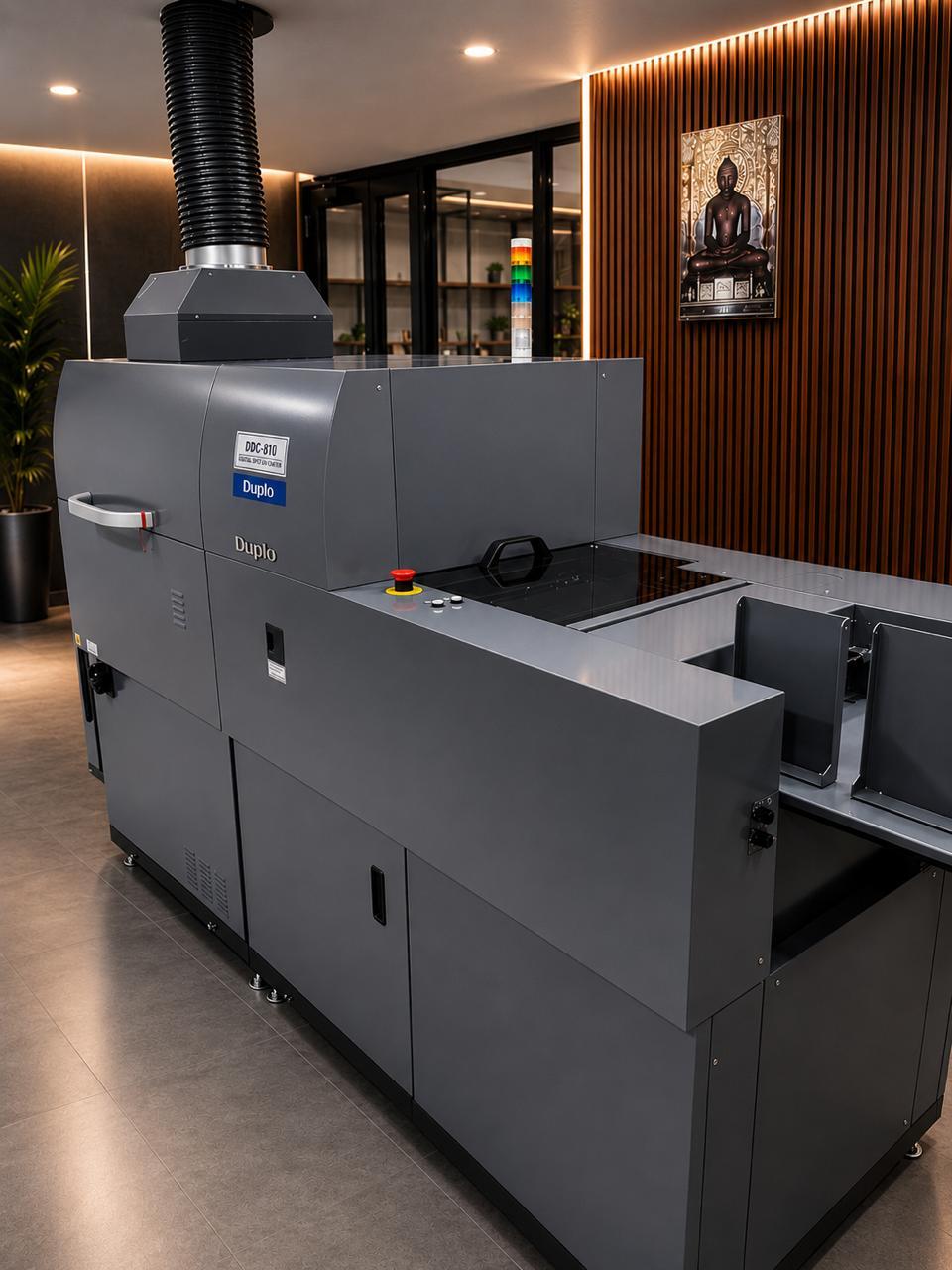 Print-finishing machine used for premium UV, foiling and luxury print effects.